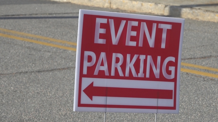 A bustling Macon Coliseum with families enjoying events.